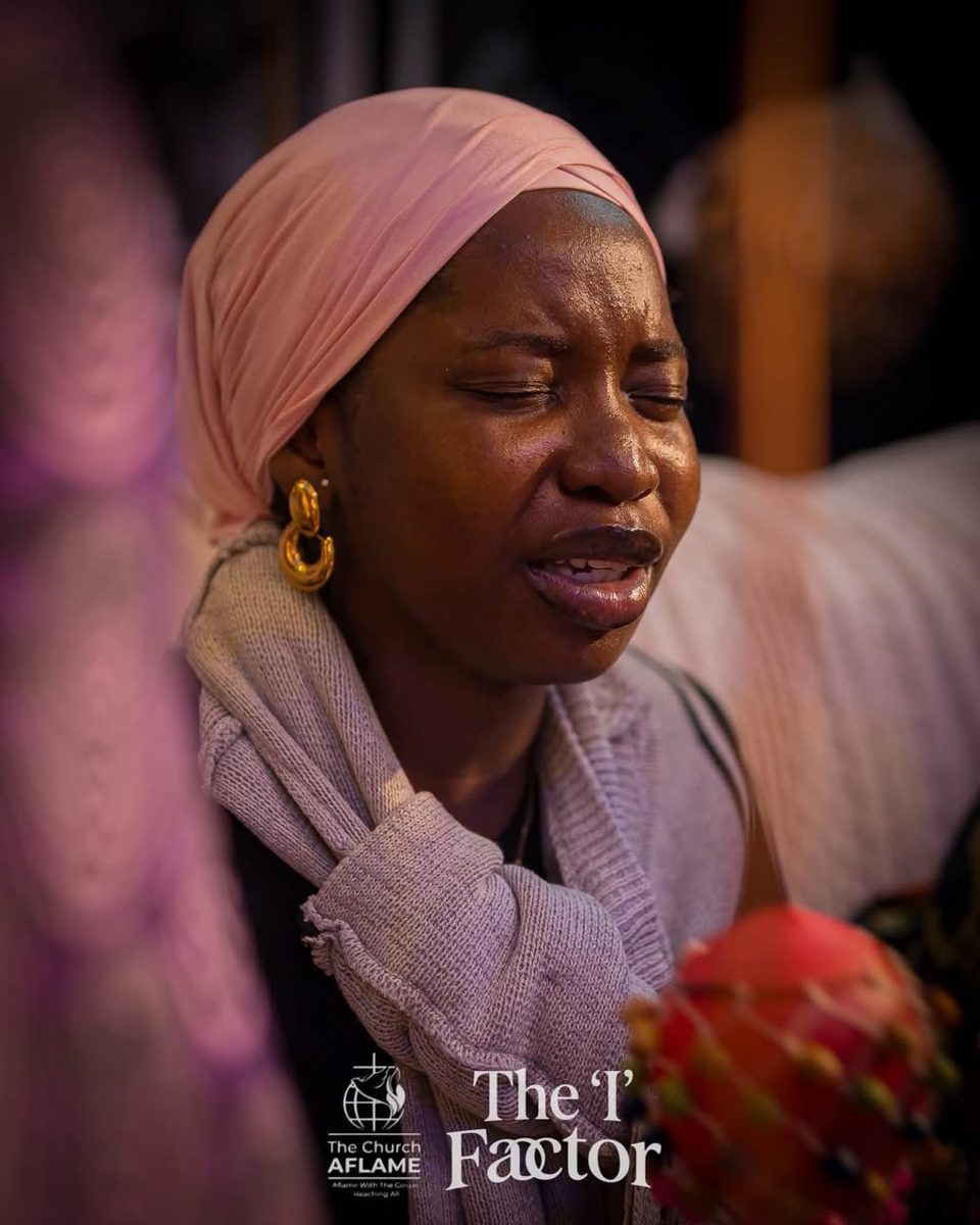 Sister singing during worship